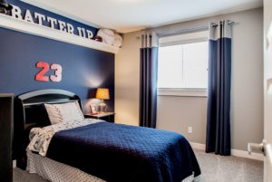 Boys blue bedroom by City Homes, Edmonton new home builder