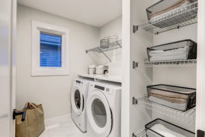 Laundry Room Photo in Single Family by City Homes Master Builder